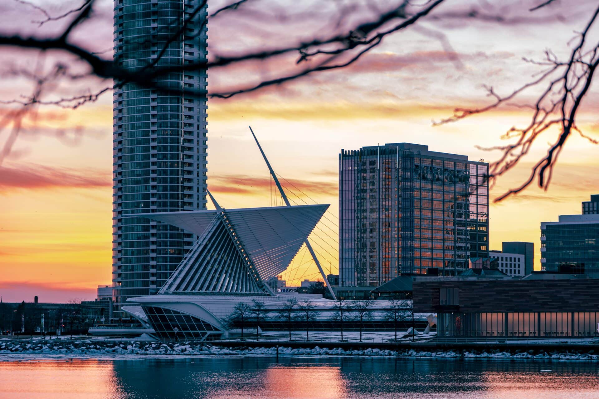 The Milwaukee Art Museum's winged pavilion and lakefront towers at sunset, Milwaukee, WI