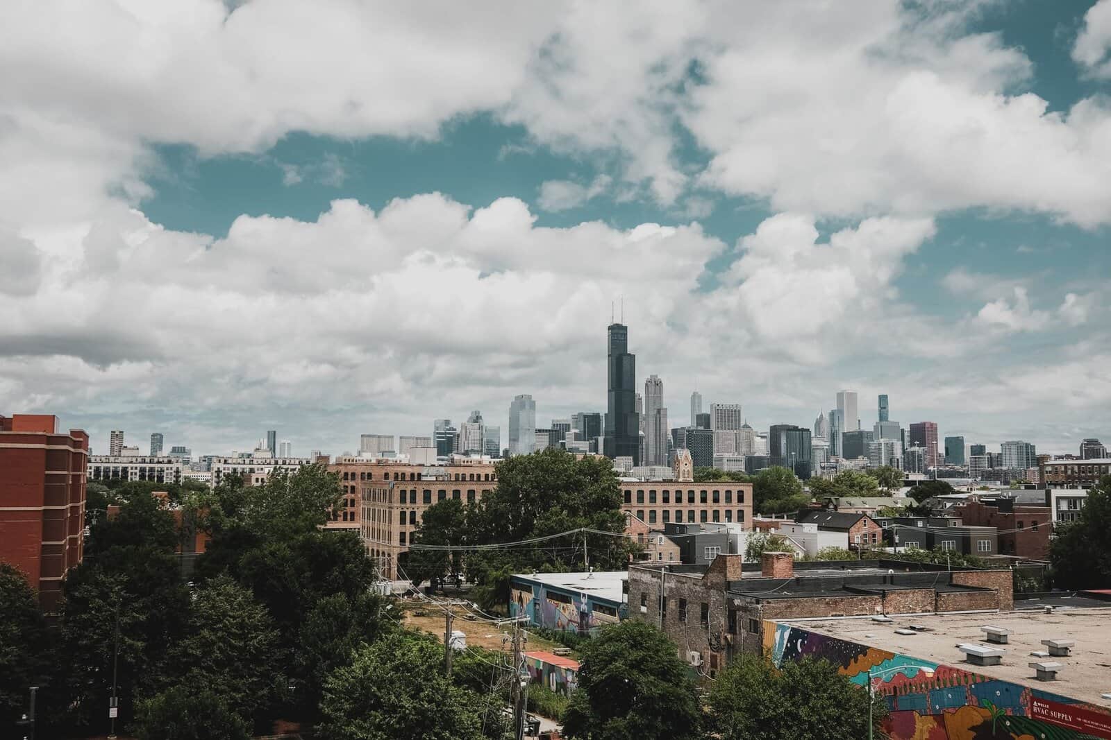 The Chicago skyline under a cloudy sky, about 26 miles southeast of Schaumburg, IL