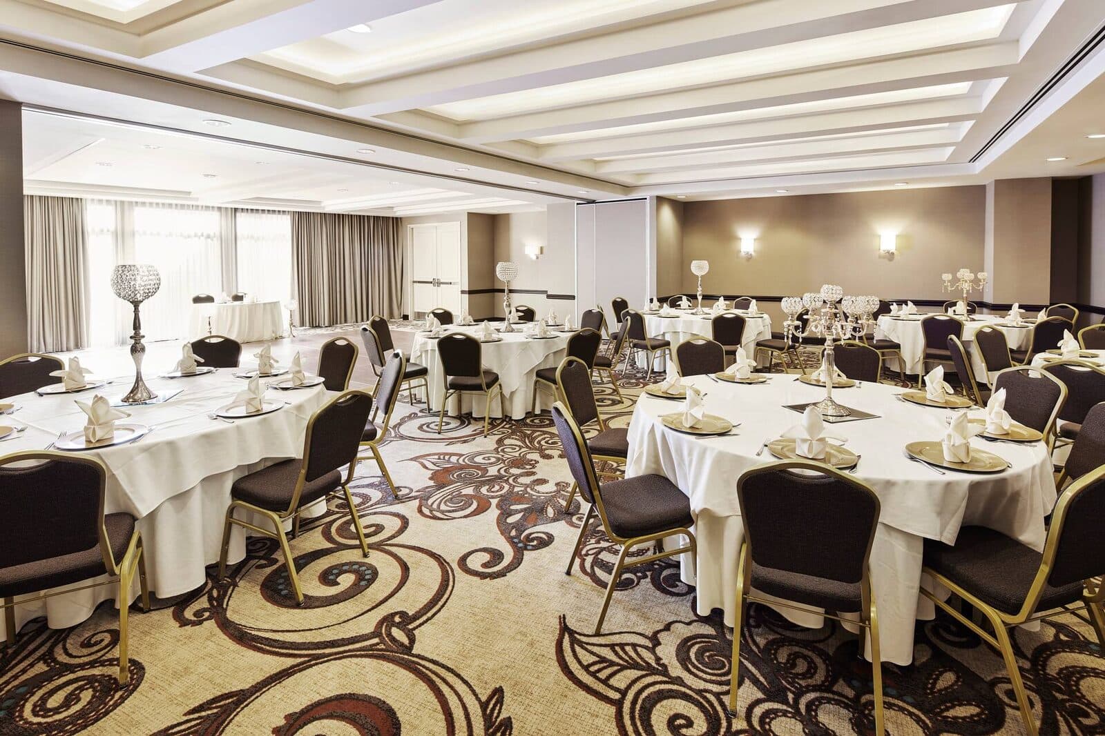 The Mason Room at Embassy Suites by Hilton Alexandria Old Town set with round banquet tables, Alexandria, VA