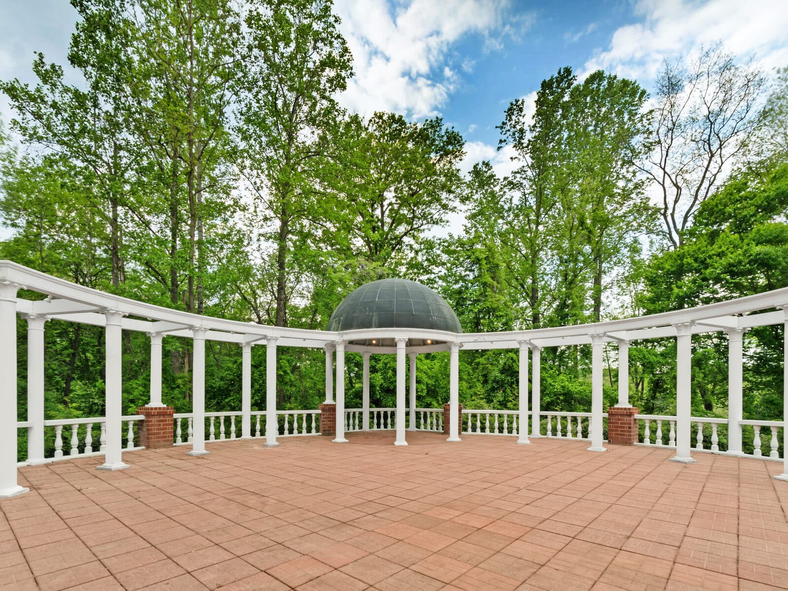 The colonnaded garden patio and gazebo at the DoubleTree by Hilton Charlottesville, Charlottesville, VA