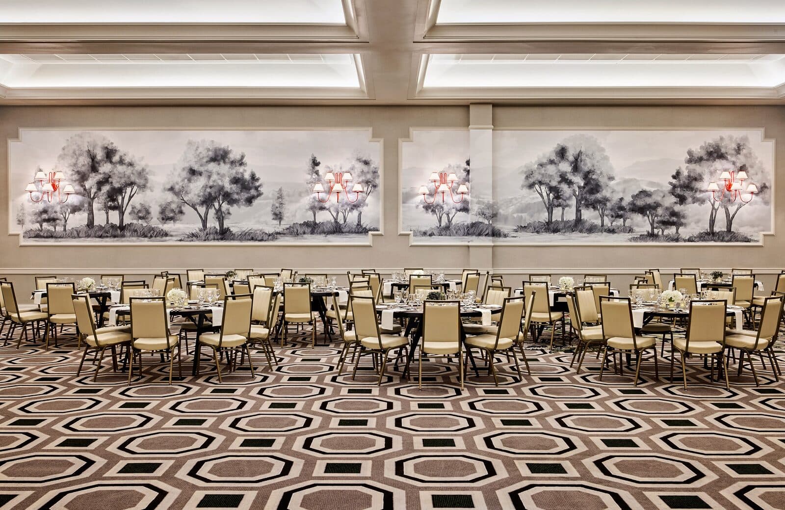 The Omni Charlottesville Hotel's Jefferson Ballroom set with banquet tables beneath a landscape mural, Charlottesville, VA