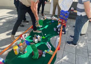 A group of people playing a game of golf.