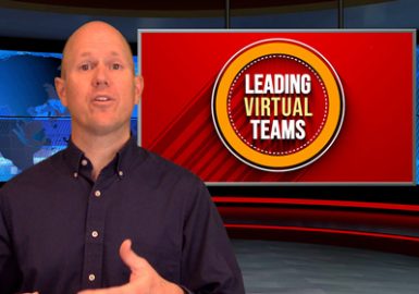 A man standing in front of a tv screen with the words leading virtual teams.