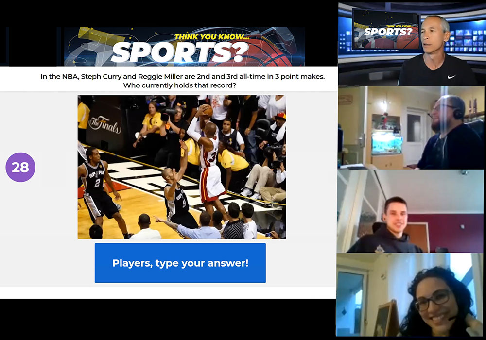 A screen showing a group of people talking about sports.