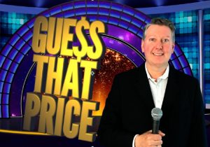 Guess that price logo with a man in a suit standing in front of a microphone.