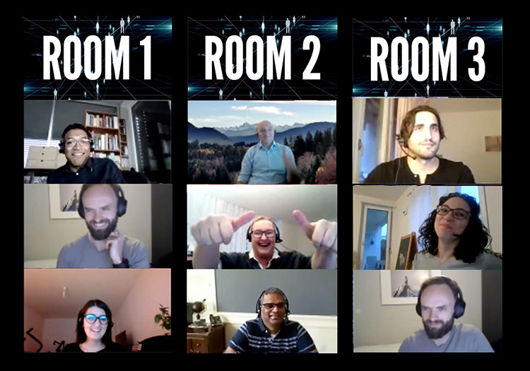 A group of people in a video conference room.