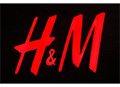 A red h & m logo on a black background.