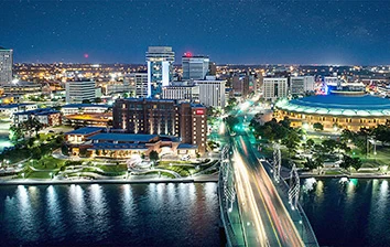 An enchanting aerial view of a city at night, creating the perfect backdrop for team building activities in Wichita.