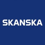 Skanska logo displayed on a blue background during a corporate event in Tampa, FL.