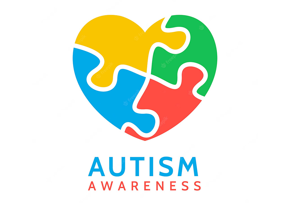 Autism awareness logo with puzzle pieces in the shape of a heart.